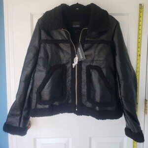 Unique cool black boxy faux leather jacket with faux fur trim & faux fur lining